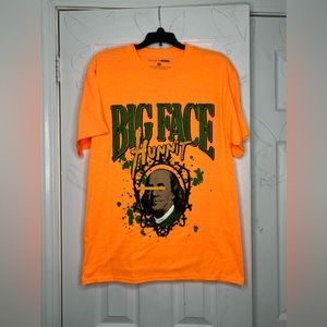 An orange graphic shirt